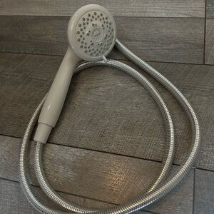 Moen Gray Handheld Shower Head with Silver Hose
